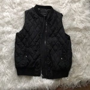 Black quilted vest